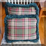 D77. Pair of green plaid pillows. 